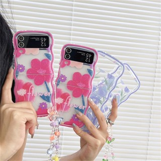 เคสโทรศัพท์มือถือ ซิลิโคนนิ่ม TPU ใส กันกระแทก ลายดอกไม้น่ารัก พร้อมสายคล้องข้อมือ สําหรับ Samsung Galaxy Z Flip 5 Z Flip 3 Z Flip 4