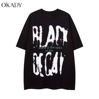 OKADY เสื้อยืดแขนสั้นผู้ชายผ้าฝ้ายอเมริกันพิมพ์ตัวอักษรหลวมด้านบนคอกลม