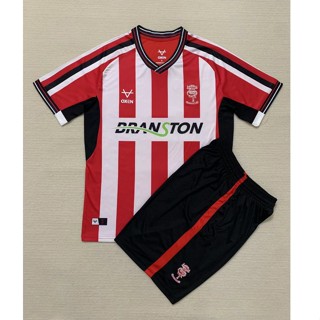 【จัดส่งด่วน】ชุดเสื้อกีฬาแขนสั้น ลายทีมฟุตบอล Lincoln City สําหรับเด็ก และผู้ใหญ่