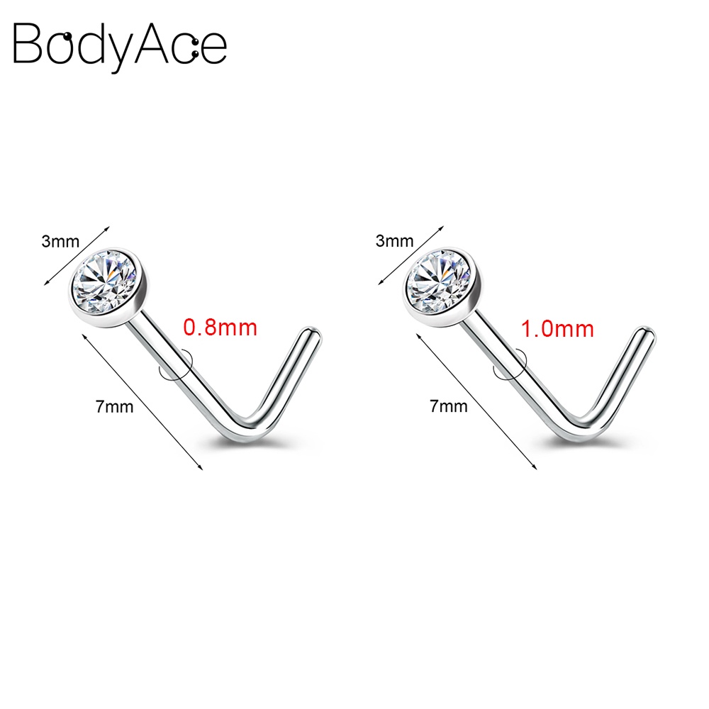 Bodyace 1 ชิ้น 0.8 / 1.0 มม. ลูกบาศก์เพทายจมูกกระดุมสแตนเลสรูปตัว L เจาะจมูกหัวใจดาวสี่เหลี่ยมเจาะรูจมูก