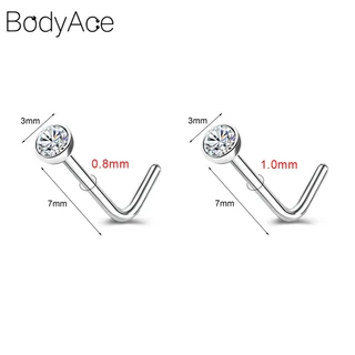 Bodyace 1 ชิ้น 0.8 / 1.0 มม. ลูกบาศก์เพทายจมูกกระดุมสแตนเลสรูปตัว L เจาะจมูกหัวใจดาวสี่เหลี่ยมเจาะรูจมูก