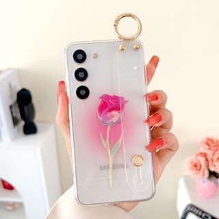 เคสโทรศัพท์มือถือ TPU ใส ลายดอกไม้ พร้อมสายรัดข้อมือ สําหรับ Samsung Galaxy S23 Ultra Plus S22 S21 S20 FE