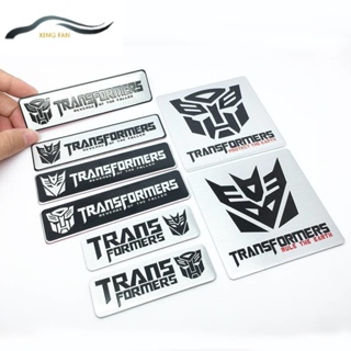 Xinfan สติกเกอร์โลโก้ โลหะผสมอลูมิเนียม รูปสัญลักษณ์ Transformers 3D สําหรับติดตกแต่งรถยนต์