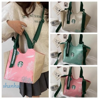 Shanhai กระเป๋าสะพายไหล่ ผ้าแคนวาส ขนาดใหญ่ จุของได้เยอะ พิมพ์ลายตัวอักษร Starbucks เข้ากับทุกการแต่งกาย สําหรับผู้หญิง และนักเรียน