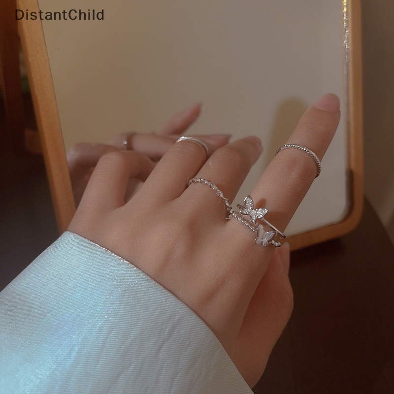 Dsth ชุดแหวนนิ้วมือแฟชั่น ทรงกลม ลายผีเสื้อ สีเงิน ปรับได้ เครื่องประดับ สําหรับผู้หญิง 4 ชิ้น