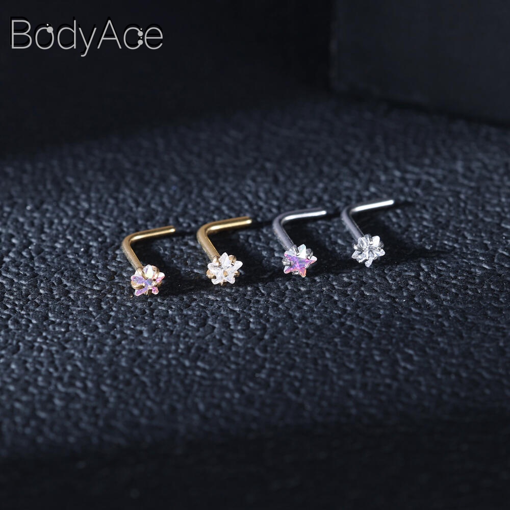 Bodyace 1 ชิ้น 0.8 / 1.0 มม. ลูกบาศก์เพทายจมูกกระดุมสแตนเลสรูปตัว L เจาะจมูกหัวใจดาวสี่เหลี่ยมเจาะรูจมูก
