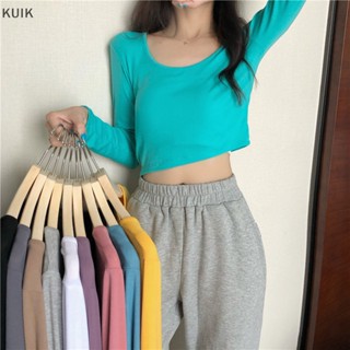 Kuik เสื้อครอปท็อปลําลอง แขนยาว คอกลม สีพื้น ทรงสลิม แฟชั่นฤดูใบไม้ร่วง สําหรับผู้หญิง