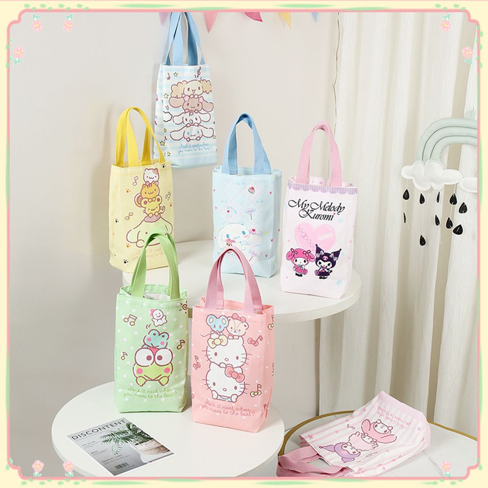 กระติกน้ำการ์ตูน กระติกน้ำร้อน กระเป๋าใส่แก้ว Sanrios Hello Kitty Cup กระเป๋าถือแคนวาสแบบพกพา Kuromi Cinnamoroll กระเป๋าสะพายไหล่ 【sunny】