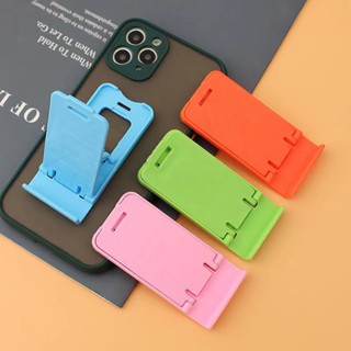 เคสโทรศัพท์มือถือ แบบพับได้ ปรับความสูงได้ สีมาการอง เรียบง่าย สําหรับ Samsung Iphone Realme