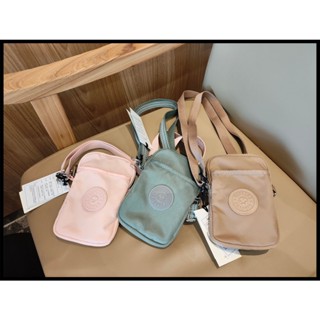 Kipling ใหม่ กระเป๋าสะพายไหล่แฟชั่น ขนาดมินิ ใส่โทรศัพท์มือถือได้ สีพื้น เหมาะกับการพกพาเดินทาง TALLY 2092