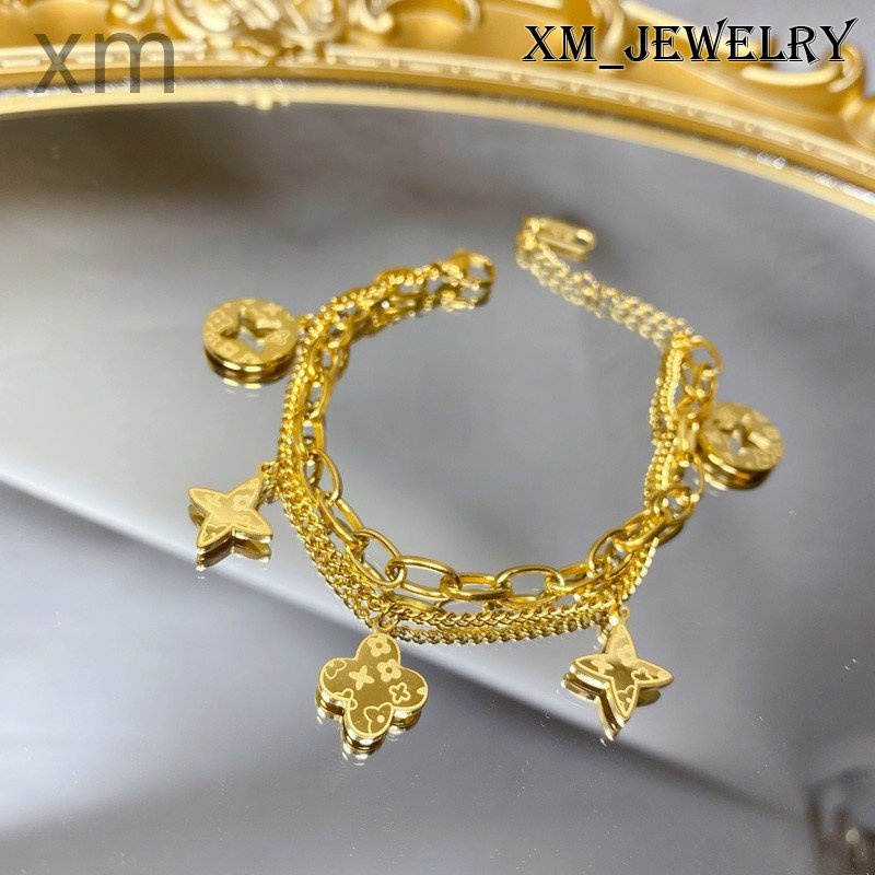 X xm Niche Design High-End Feeling ไทเทเนียมเหล็ก 18K Gold Presbyopic คลาสสิกสร้อยข้อมือสร้อยข้อมือห