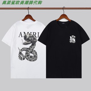 Amiri TEE เสื้อยืดลําลอง แขนสั้น คอกลม พิมพ์ลายโลโก้ตัวอักษร ทรงหลวม สําหรับผู้ชาย และผู้หญิง