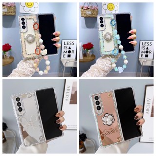 เคสโทรศัพท์มือถือ ฝาพับ แต่งกลิตเตอร์ เพชร โบว์ 3D ระยิบระยับ สําหรับ Samsung Z Fold4 Z Fold3 Z Fold 4 Z Fold 3