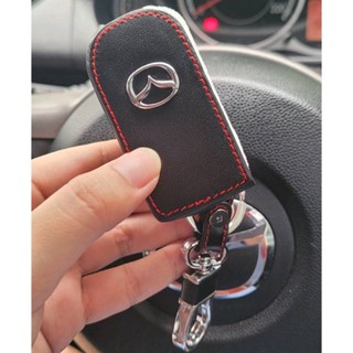 ซองกุญแจรถ ซองหนังแท้ ใส่กุญแจรีโมทรถยนต์ รุ่นโลโก้เหล็ก Mazda 2,3 พับข้าง รุ่น 2 ปุ่ม