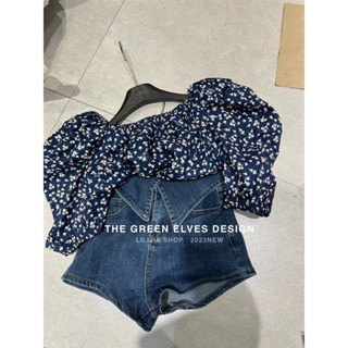 Korean version of sweet bubble sleeve broken flower shirt summer design sense niche mixed denim shorts two-piece set