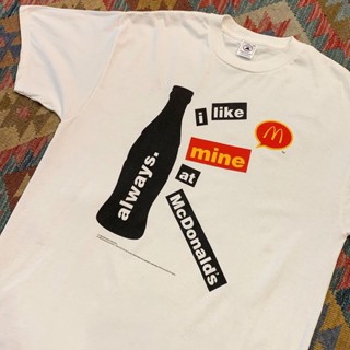 เสื้อยืดแขนสั้น ผ้าฝ้ายแท้ ทรงหลวม พิมพ์ลาย McDonalds drink สําหรับผู้ชาย และผู้หญิง