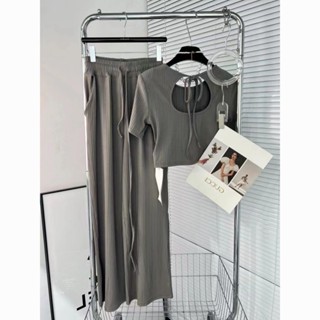 Fashionable leisure suit for women in summer 2023 new style short blouse with beautiful shoulder and beautiful back two-piece set of wide-leg trousers