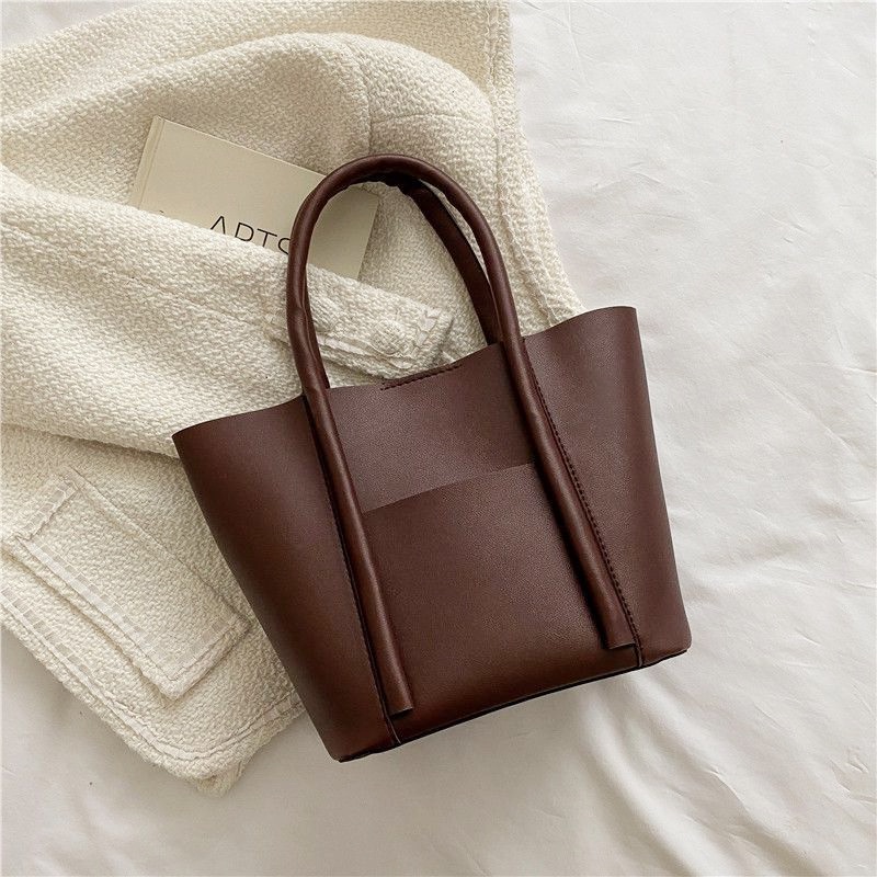 กระเป๋าถือสุภาพสตรีแฟชั่น กระเป๋าหิ้วเนื้อความจุสูง แฟชั่นใหม่แฟชั่นที่เรียบง่าย