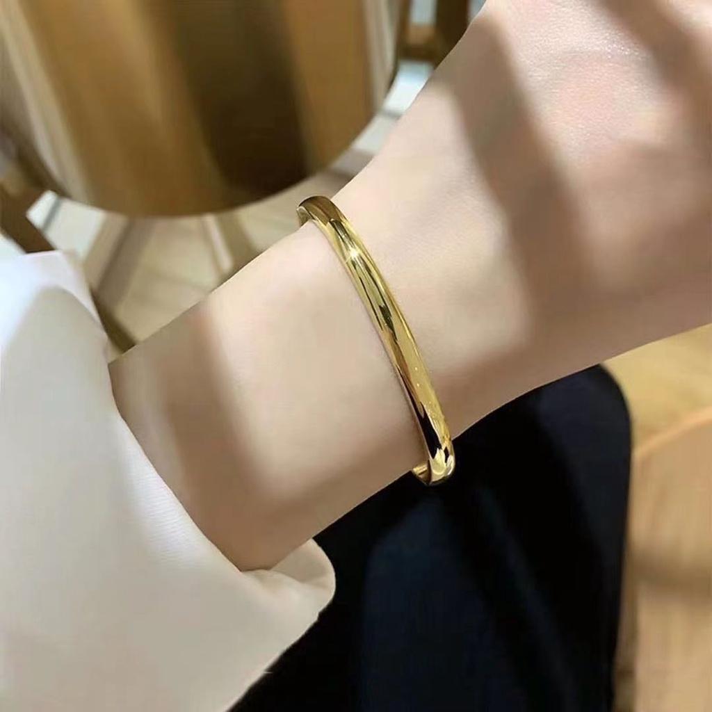 สร้อยข้อมือไทเทเนียม เหล็กสเตนเลส ชุบทอง 18k ทรงวงรี อเนกประสงค์ แบบเรียบง่าย สําหรับผู้หญิง ของขวัญ