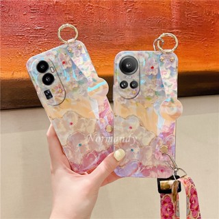 เคสโทรศัพท์มือถือแบบนิ่ม TPU ลายภาพวาดสีน้ํามัน รูปดอกซากุระ แต่งพลอยเทียม แสงสีฟ้า พร้อมสายคล้องข้อมือ สําหรับ OPPO Reno10 Pro+ Pro Plus A78 NFC 5G 4G