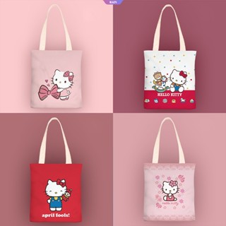 ใหม่ Sanrio กระเป๋าสะพายไหล่ กระเป๋าถือ กระเป๋าช้อปปิ้ง ผ้าแคนวาส ลายการ์ตูน Hello Kitty น่ารัก ความจุเยอะ 38 ซม. สําหรับนักเรียนผู้หญิง [RAIN]