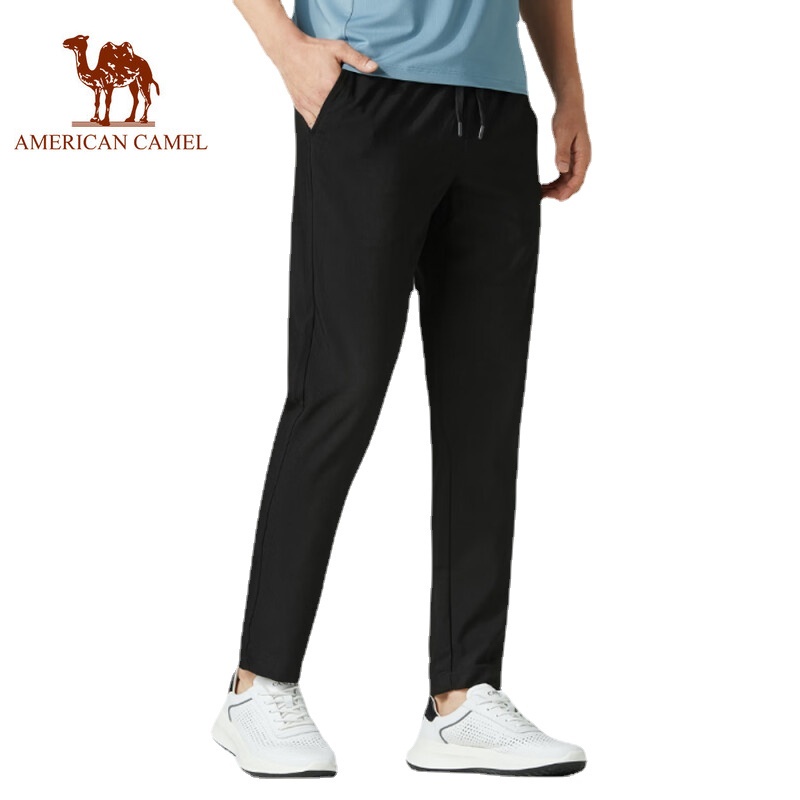 American CAMEL กางเกงลําลอง ผู้ชาย อินเทรนด์ หลวม กางเกงกีฬา เบา และระบายอากาศ