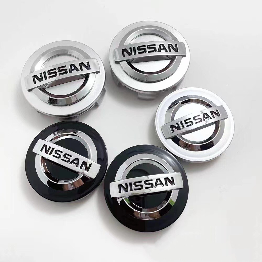Carlon ฝาครอบดุมล้อรถยนต์ ขนาด 54 มม. 60 มม. สําหรับ Nissan Altima Navara leaf X-Trail Serena D22 March Livina Sunny Sylphy Juke Cherry Tiida Sentra C27 N16 NP300 4 ชิ้น