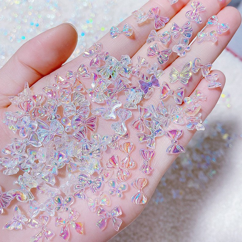 โบว์เรซิ่น รูปผีเสื้อน่ารัก 3D ขนาดเล็ก สําหรับตกแต่งเล็บ DIY 50 ชิ้น