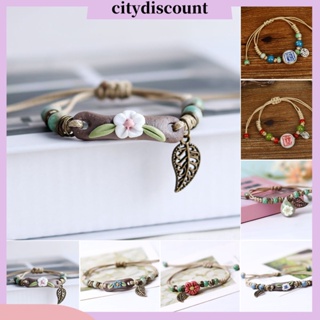 &lt;citydiscount&gt; สร้อยข้อมือ ประดับลูกปัดเซรามิคถัก ลายดอกไม้ ใบไม้กลวง ปรับได้ เครื่องประดับแฟชั่น สําหรับผู้หญิง นักเรียน