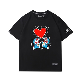 เสื้อยืดแขนสั้น ผ้าฝ้ายแท้ พิมพ์ลาย Keith haring Co branded Doraemon Machine Cat แฟชั่นคู่รัก