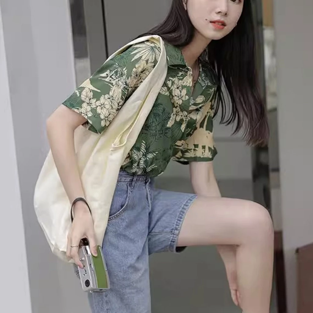 เสื้อเชิ้ตแขนสั้นลายดอกไม้ Hawaii ใส่ได้ทั้งชาย-หญิง thumbnail 5