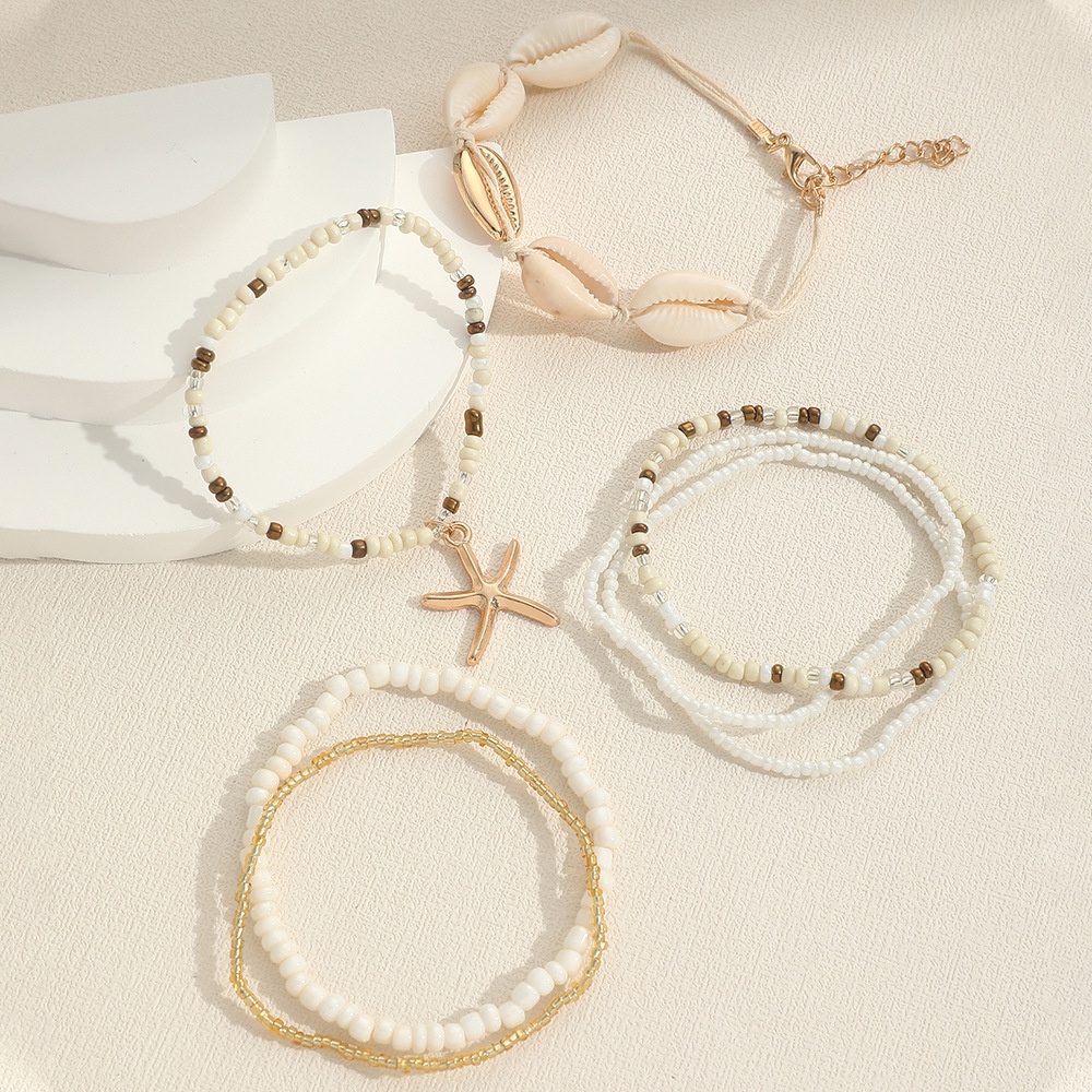 ชุดเครื่องประดับ สร้อยข้อมือ ประดับลูกปัด จี้เปลือกหอย ปลาดาว เหมาะกับเดินชายหาด แฟชั่นฤดูร้อน สไตล์โบฮีเมียน