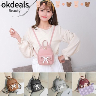 Okdeals กระเป๋าเป้สะพายหลัง กระเป๋านักเรียน หนัง PU ประดับโบว์ ขนาดเล็ก ฉลุลาย สวยงาม สําหรับผู้หญิง