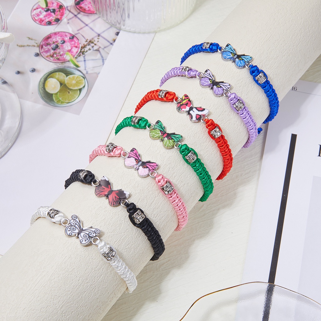 สร้อยข้อมือ กําไลข้อมือถัก จี้ผีเสื้อ สีพื้น หลากสี ปรับได้ ของขวัญปาร์ตี้ สําหรับผู้หญิง