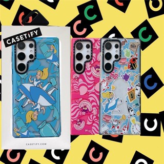 CASETIFY เคสโทรศัพท์มือถือ TPU นิ่ม แบบใส กันกระแทก ลายกลิตเตอร์ สําหรับ Samsung Galaxy S23 Ultra Plus S22 Ultra【Alice in Wonderland】