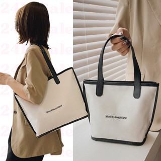 shop24📱สต็อกไทย กระเป๋าผ้าแคนวาสแต่งขอบหนัง สกรีนตัวหนังสือ 2 สี 2 ขนาด