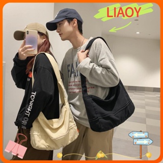 Liaoy กระเป๋าสะพายไหล่ กระเป๋าช้อปปิ้ง ผ้าแคนวาส น้ําหนักเบา จุของได้เยอะ สีพื้น แฟชั่นสําหรับผู้หญิง