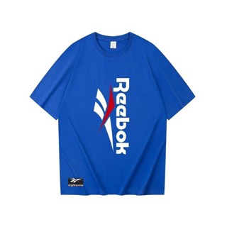 เสื้อยืดแขนสั้นลําลอง พิมพ์ลายโลโก้ Reebok ทรงหลวม แฟชั่นฤดูร้อน สไตล์สปอร์ต สําหรับผู้ชาย และผู้หญิง