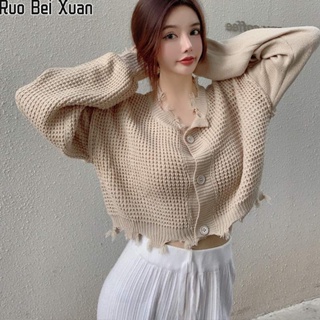 Ruo Bei Xuan ใหม่ของผู้หญิงถักคาร์ดิแกนถักขอบกลวงออกเวอร์ชั่นเกาหลีหลวมทุกการแข่งขันด้านบนสั้นแขนยาวแจ็คเก็ต