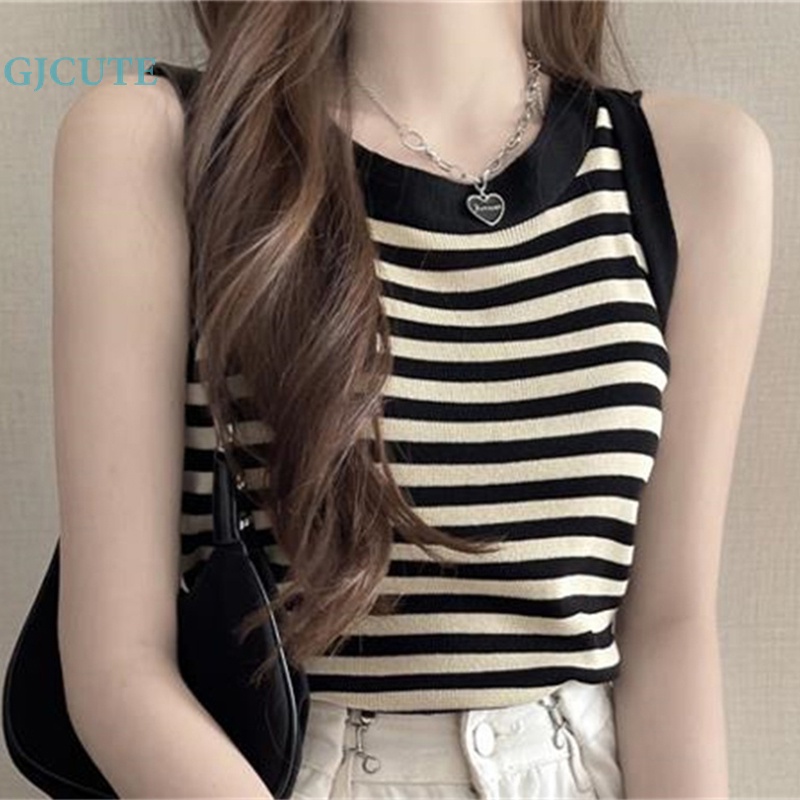 Gjcute เสื้อท็อป คอกลม แขนกุด ผ้าถัก ลายทาง สไตล์เกาหลี สําหรับผู้หญิง WTD