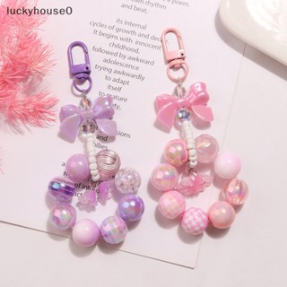 Luckyhouse0^^ พวงกุญแจอะคริลิค จี้รูปดอกลิลลี่ ประดับโบว์ หลากสี สําหรับห้อยกระเป๋าเป้สะพายหลัง หูฟัง