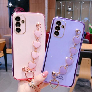 เคสโทรศัพท์มือถือ ซิลิโคนนิ่ม พร้อมสายคล้องข้อมือ จี้หัวใจ หรูหรา สําหรับ Samsung Galaxy A14 A34 A54 A13 A23 A33 A53 5G A04 A04S A04E