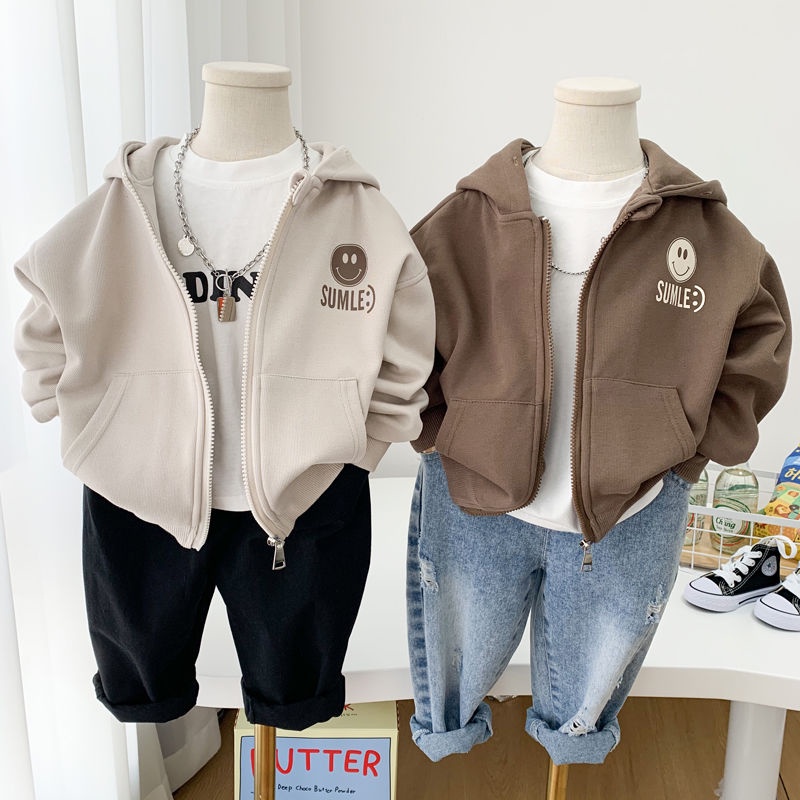 【พร้อมส่ง】เสื้อแจ็กเก็ตกันหนาวลําลอง ผ้าฝ้าย มีฮู้ด ลายหน้ายิ้ม สไตล์เกาหลี แฟชั่นฤดูใบไม้ผลิ ฤดูใบไม้ร่วง สําหรับเด็กผู้ชาย อายุ 3-15 ปี เสื้อกันหนาวเด็กชายมีฮู้ด