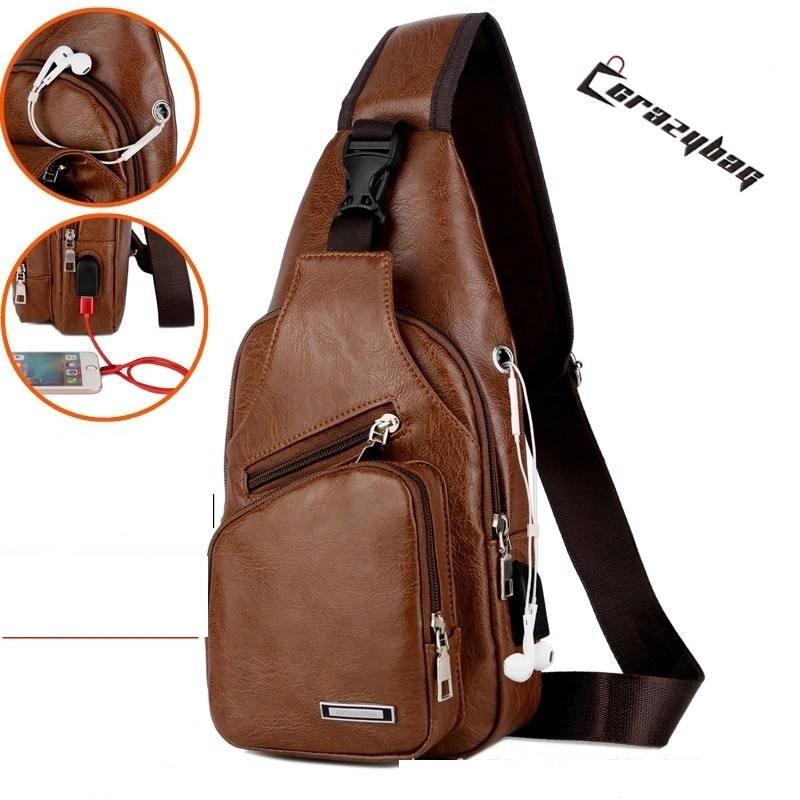 Crazy Bag กระเป๋าสะพายข้างหนังผู้ชายลําลองพร้อมที่ใส่หูฟัง USB
