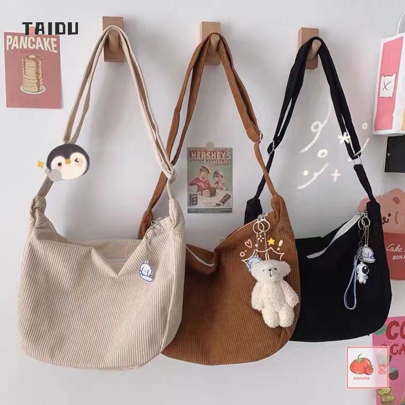 TAIDU กระเป๋าขนมจีบไหล่เดียวสไตล์ขี้เกียจผ้าลูกฟูก กระเป๋าร่อซู้ลแบบเรียบง่ายสำหรับวรรณกรรมและศิลปะของญี่ปุ่นที่เข้ากันทั้งหมด ชิคๆ สไตล์นักเรียนเกาหลี