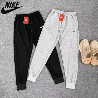 Nike ของแท้ 100% กางเกงขายาวลําลอง ใส่สบาย เหมาะกับการวิ่งจ๊อกกิ้ง กลางแจ้ง สําหรับผู้ชาย