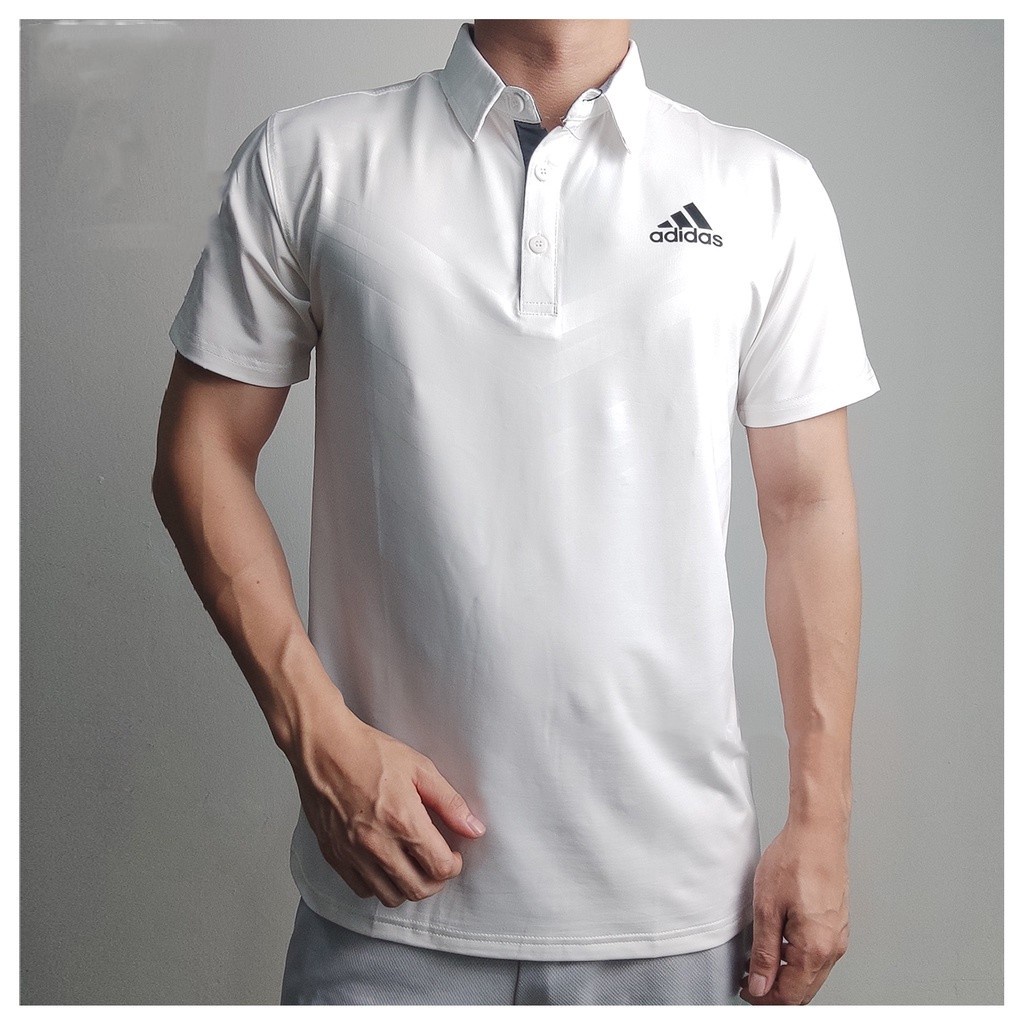 Adidas เสื้อโปโลแขนสั้น คอปก ผ้าโพลีเอสเตอร์ ลายโลโก้ สําหรับฝึกตีกอล์ฟ บาจู เหมาะกับผู้ชาย