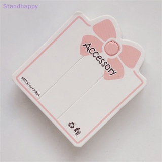 Standhappy ใหม่ ป้ายแท็กกระดาษ 2 รูขุมขน รูปโบว์ สีชมพู ขนาดเล็ก สําหรับเครื่องประดับผม สร้อยข้อมือ 50 ชิ้น