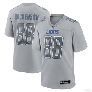 เสื้อกีฬาแขนสั้น ลายทีม NFL Detroit Lion Jersey เสื้อยืด พิมพ์ลาย Hockenson Football สีเทา พลัสไซซ์