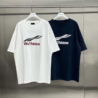 【พร้อมส่ง】WE11DONE เสื้อยืดแขนสั้น พิมพ์ลายตัวอักษร ทรงหลวม สไตล์คลาสสิก สําหรับผู้ชาย และผู้หญิง